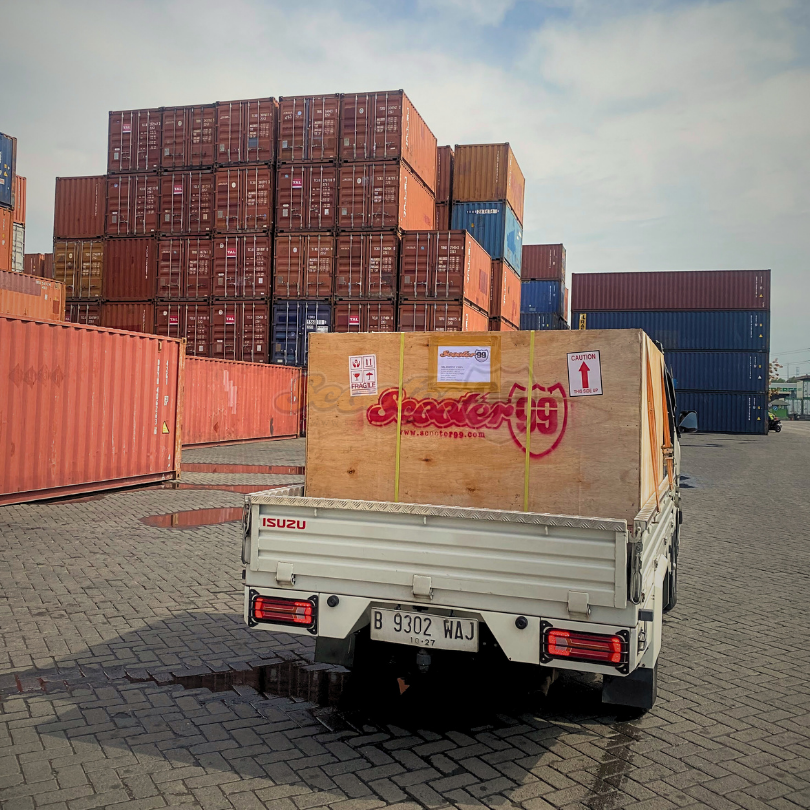 Interior crate padding and tie-down points for scooter & sidecar